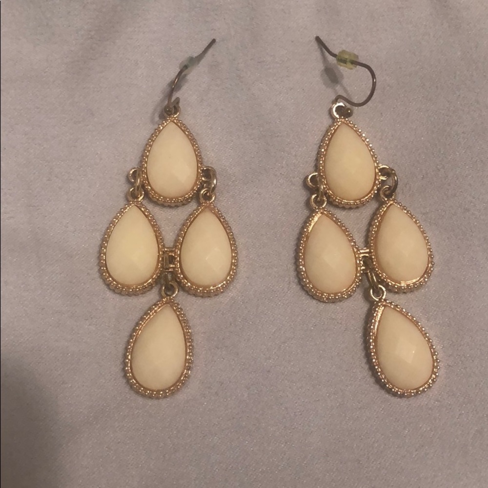 White and gold earrings